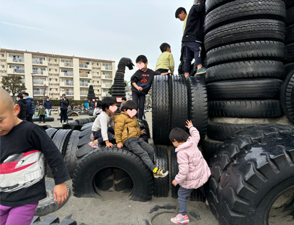 Retro shopping street and tire Godzilla park