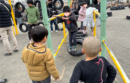 Retro shopping street and tire Godzilla park